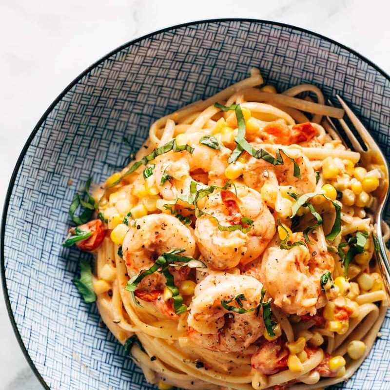 A picture of Creamy Shrimp Pasta with Corn and Tomatoes