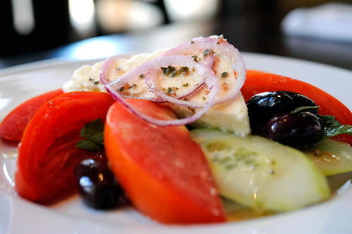 Kouzzina Spiro's Salad: tomatoes, cucumbers, red onions, kalamata olives and feta