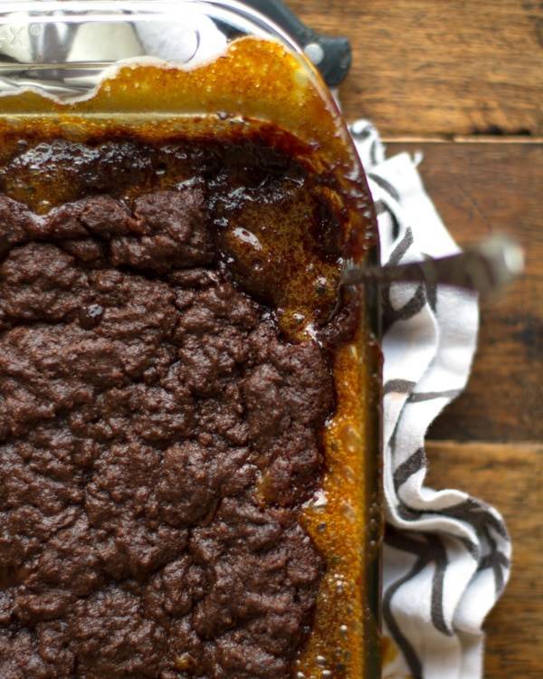 Chocolate caramel cake in a baking dish.