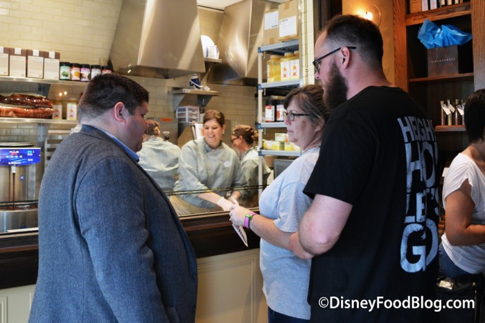 Cast Member Explaining the Ganache Making Process