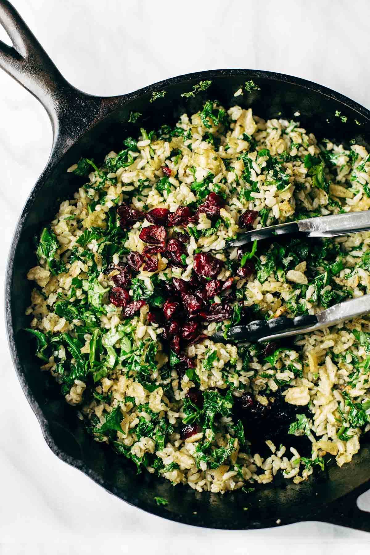 Garlic Kale and Brown Rice Salad with a zippy lemon herb dressing! This side dish recipe is so simple and it compliments almost any main dish! | pinchofyum.com
