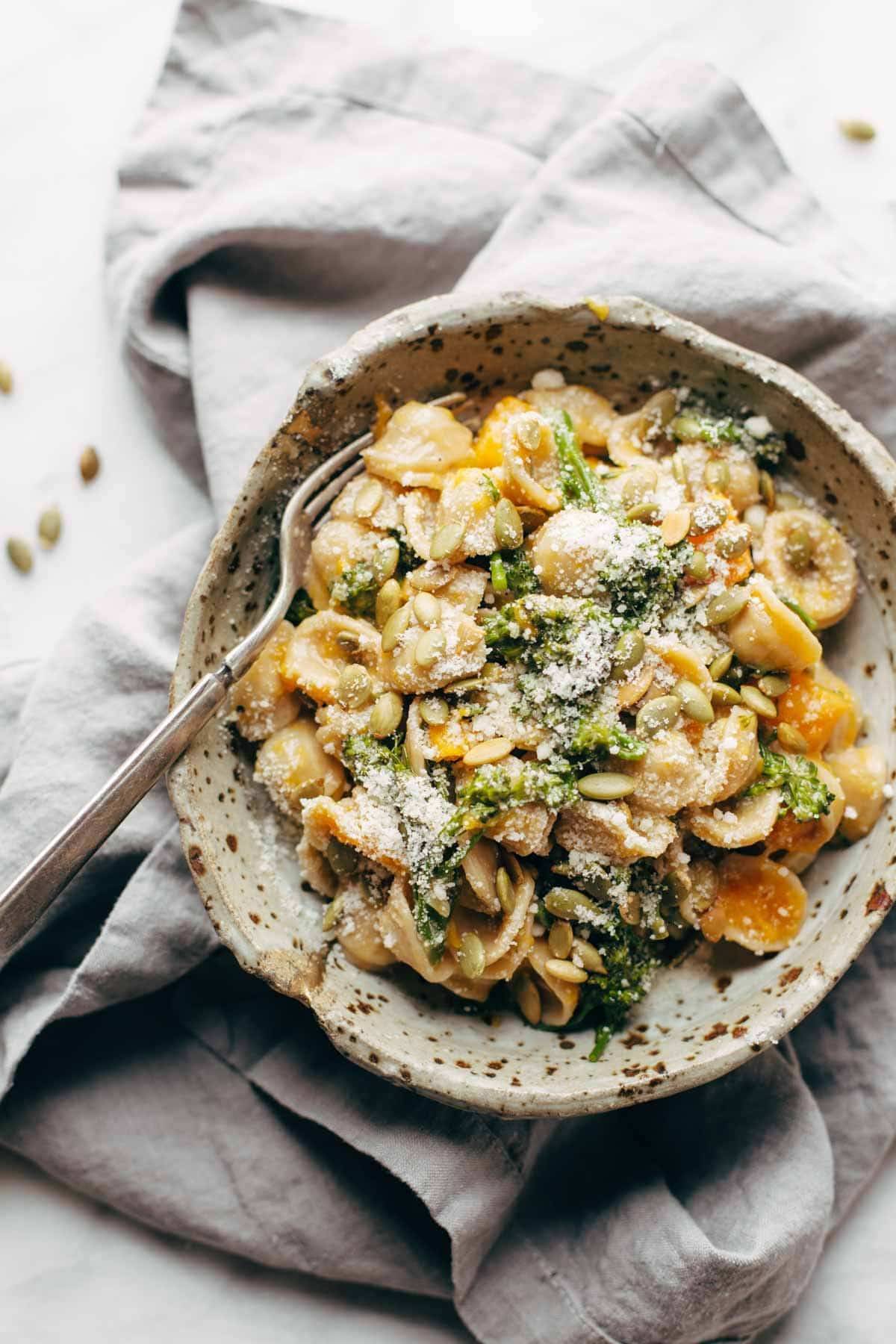 Creamy Parmesan Orecchiette in a bowl with a fork