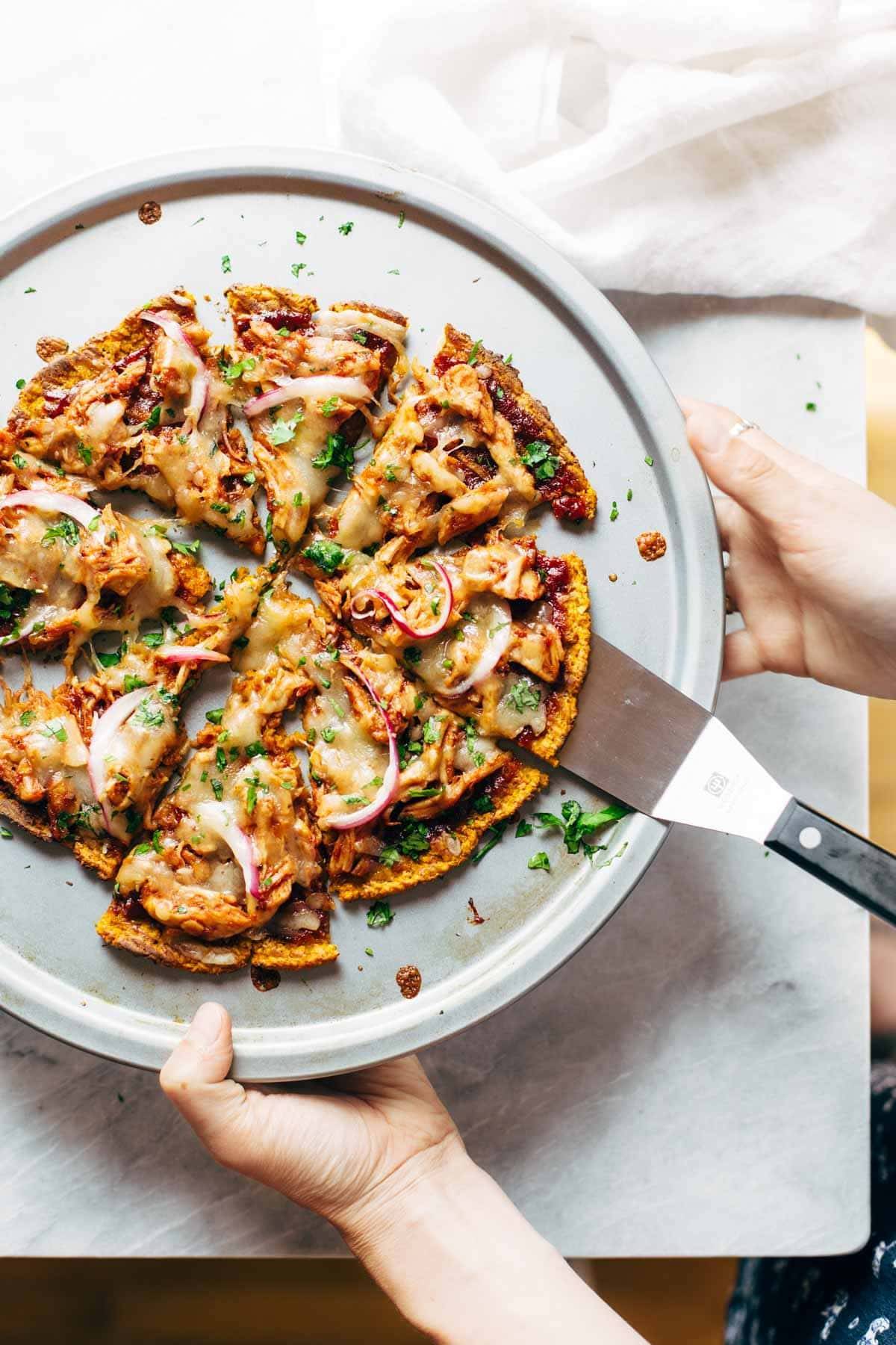 Sweet potato crust pizza on a pan.