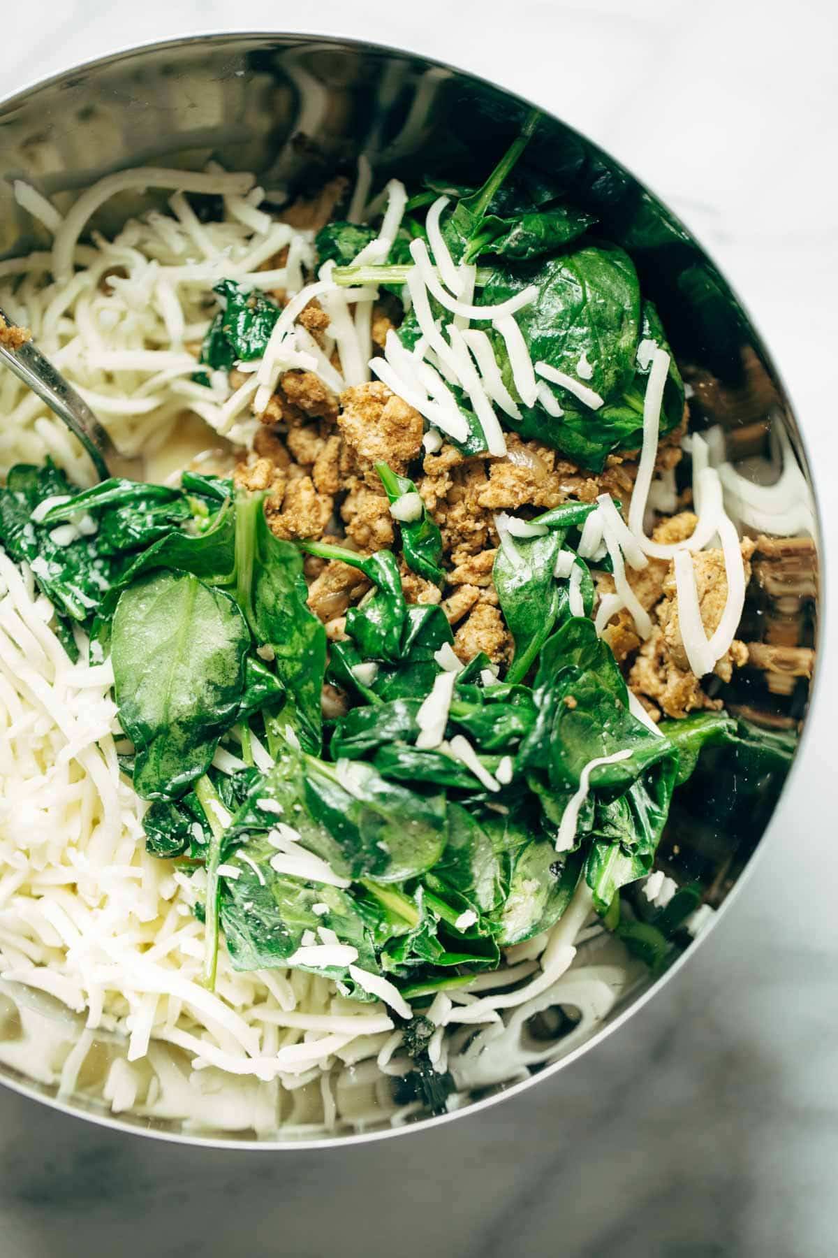 Breakfast Casserole with sausage, eggs, potatoes, spinach, and cheese! Super easy recipe that's ready in 30 minutes and high in protein. | pinchofyum.com